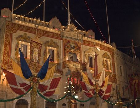 St Catherine Band Club facade all decorated for the local village festa in the town of Zurrieq in Malta celebrating their patron saint St Catherine of Alexandria