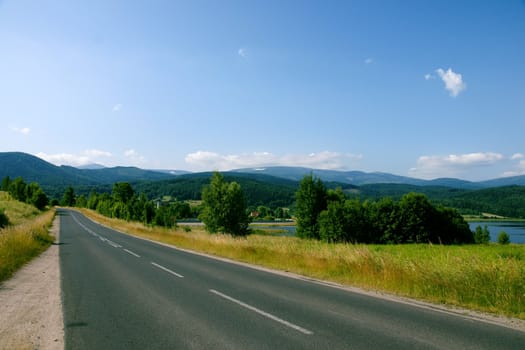 Landscape with asphalt way thru the mountain