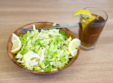 fresh lettuce salad with lemon