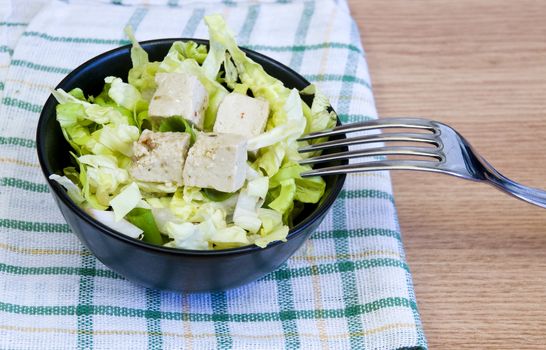 lettuce salad with tofu cheese