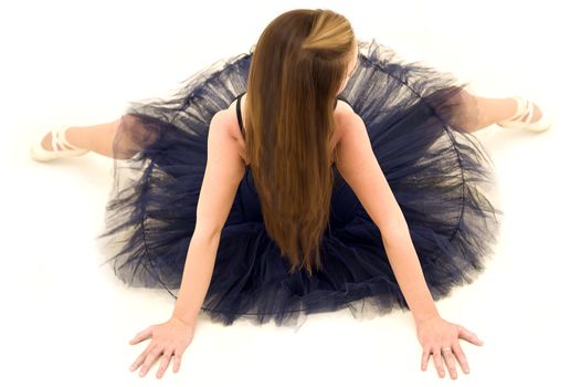 posing dancer viewed from top with arms and legs apart