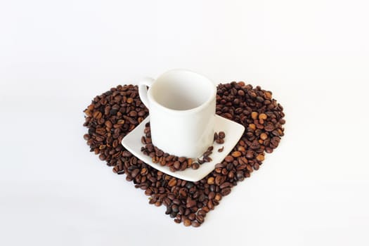 coffee, mug and heart from coffee on white background