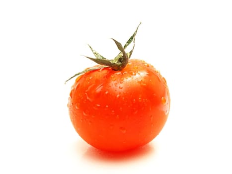 Fresh red tomato toward white background with green grass on top