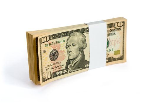 Wad of 10 dollar bank notes isolated on white. Clipping path included to easy remove object shadow or replace background. The United States ten-dollar bill ($10) is a denomination of United States currency. The first U.S. Secretary of the Treasury, Alexander Hamilton is currently featured on the obverse of the bill.