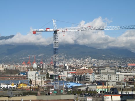 blue and white construction crane