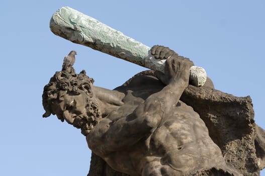 Shot of the architectural detail - sculpture of Hercules.
Mythological scene - Match of Giants
Author - I. Platzer 1768.
Prague, Czech republic, Europe.