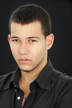 young caucasian man, black background