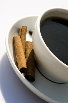 closeup on a white coffee cup, natural lighting