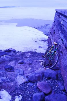 Bike by icy lake