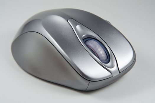 Image of cordless optical mouse on gray background
