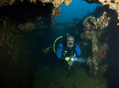 A recreational diver explores a passenger liner turned Japanese submarine tender during World War II. The Rio De Janeiro Maru was sunk during Operation Hailstone, February 1944, in Truk (Chuuk) Lagoon, Micronesia