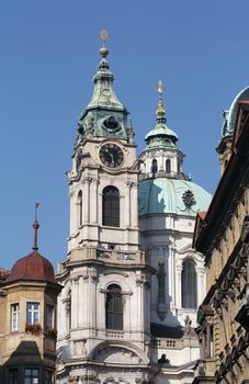 St Nikolas church, one of the most important buildings of baroque Prague, with a dominant dome and belfry. Originally a Gothic church -from 1283- stood on this site. From 1704 to 1756, it was rebuilt as the seventy nine metre high Baroque church. 
Architects - K. Dientzenhofer, K.I. Dientzenhofer, A. Lugaro.
Prague, Lesser Town, Czech republic, Europe.