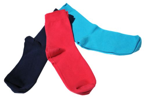 three colorful socks on  the white background
