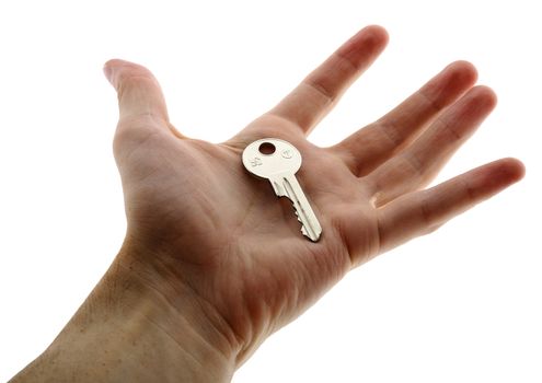 Silvery key on male palm on white background