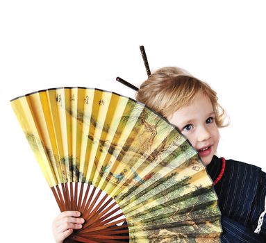 little girl with fan wearing like oriental girl