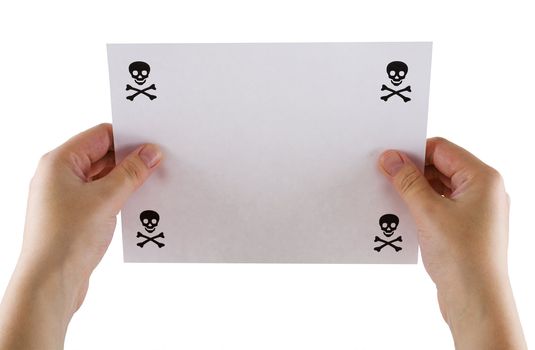 Sheet of paper in hands with the image jolly Roger on a white background