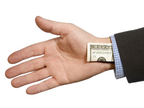 A man's hand hiding a one hundred dollar bill up his sleeve.