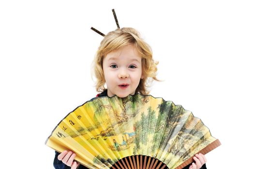 little girl with fan wearing like oriental girl
