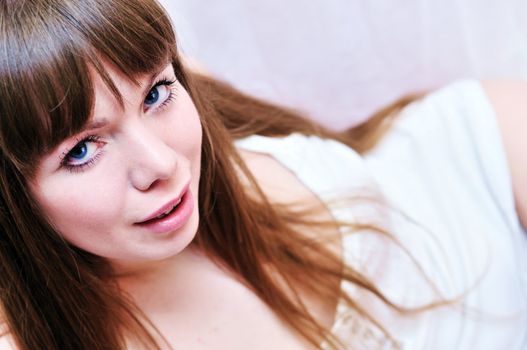  Portrait of young beauty  laying woman 