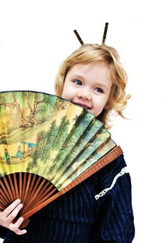  little girl with fan wearing like oriental girl.