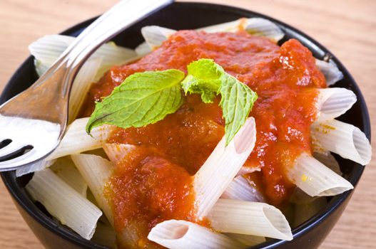 closeup on a bowl full of pasta