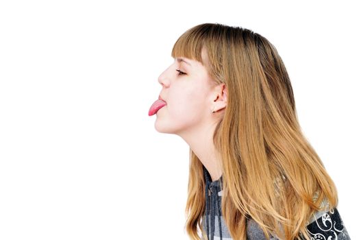   funny teen girl showing her tongue out

