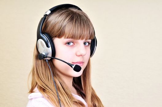 teenage girl in headphones chating with friend
