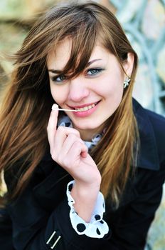 portraut of teen girl with chewing gum