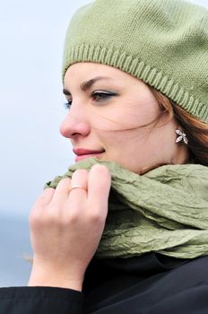 portrait of lovely girl wearing green beret