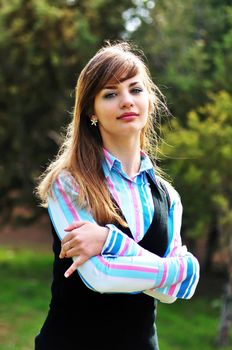 sweet teen girl outdoors in spring time