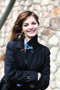 portrait of smiling teen girl outdoors in spring time
