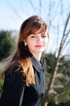 beautiful teen girl in the park in spring time
