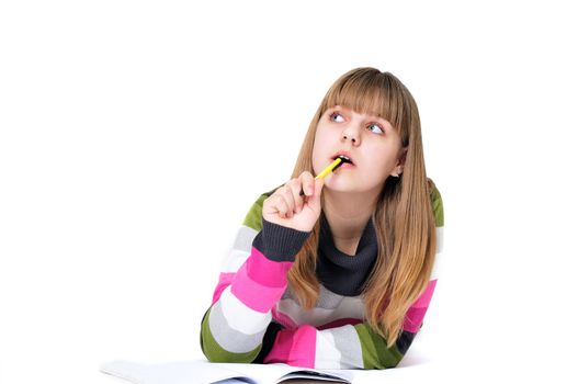 writing dreaming laying sweet teen girl over the white