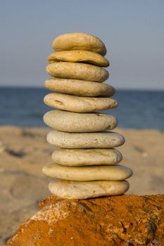 Nicely stacked tower of rocks on beach
