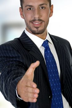  man offering hand shake on an isolated background 