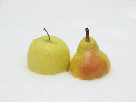 Apple and pear on a snow      