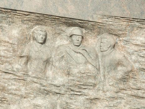 Fragment of the granite monument, devoted to the termination of the second world war. Russia, Karelia, Petrozavodsk        