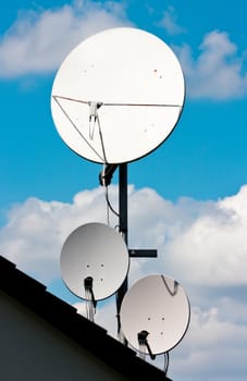 This image shows three satellite antennas