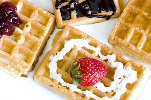 delicious freshly made waffles, whip cream and berry