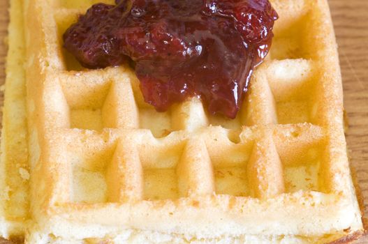 closeup on cherry jam waffle