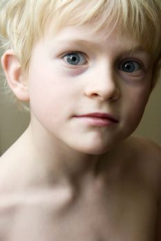portrait of a little boy with blue eyes