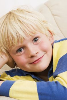 Blond little boy smiling
