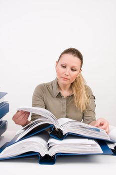 Confident business woman working with documents