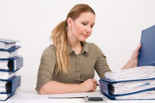 Confident business woman working with documents