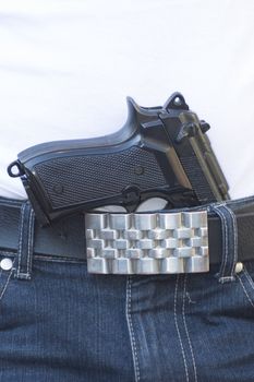 handgun in pants, white shirt
