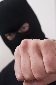 evil criminal wearing military mask