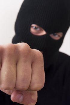 evil criminal wearing military mask