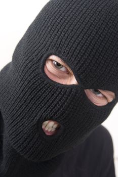evil criminal wearing military mask