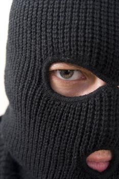 evil criminal wearing military mask