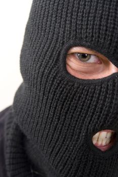 evil criminal wearing military mask